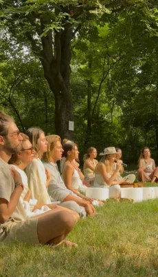 A graduating group of the training gathered outdoors in Vienna